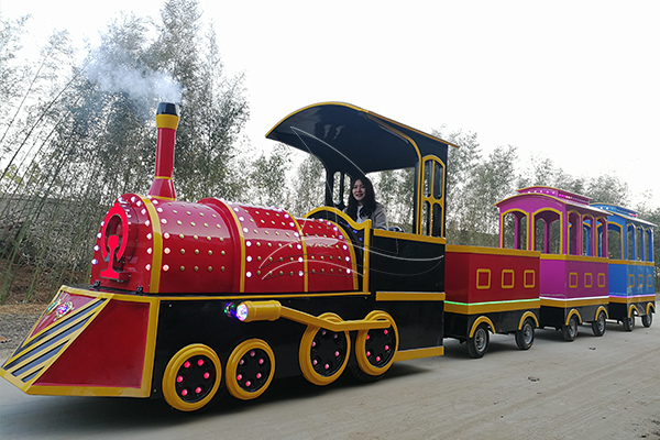 When Does a Vintage Amusement Park Train Need a Second Carriage to Keep the Timetable?
